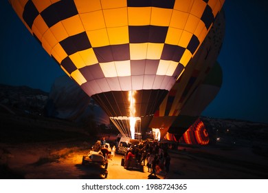 Inflating Hot Air Balloons At Night