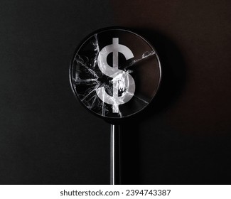 Inflation, economic crisis, financial problems, recession concept. Close-up of broken cracked magnifier glass focused on dollar sign on black background. - Shutterstock ID 2394743387
