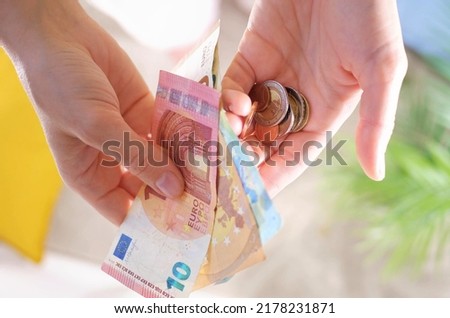 Inflation and hyperinflation financial concept. Property tax and money leverage. falling salaries and purchasing power. poverty and famine. Social security concept. euro banknotes and euro coins.
