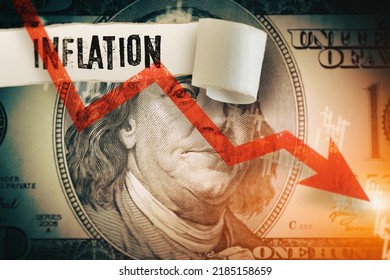 Inflation word under the torn dollar bill.  Economist forecast for the United States. Glowing red arrow going downwards on Benjamin Franklin portrait. US economy, inflation, crisis and recession.