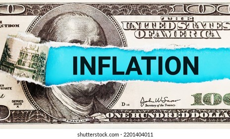 Inflation World Economics And Inflation Control Concept. Torn Bills Revealing Inflation Words. Idea For FED Consider Interest Rate Hike, US Dollar Inflation.