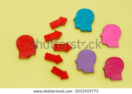 Influence and persuasion concept. Influencer and red arrows. [[stock_photo]] © 