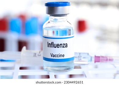 Influenza vaccine in a vial, immunization and treatment of infection, vaccine used for disease prevention - Shutterstock ID 2304492651