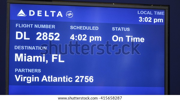 Info Screen at gate for Delta Flight to Miami - NEW\
YORK, USA - APRIL 9, 2016