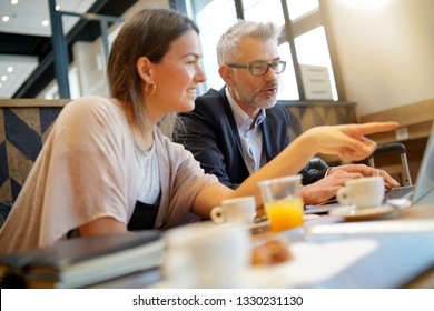 Informal Breakfast Meeting Between Salesman And Manager