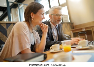 Informal Breakfast Meeting Between Salesman And Manager