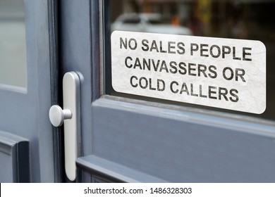 Information Board Of No Salespeople Cold Callers Or Canvassers Sing On A Glass Door