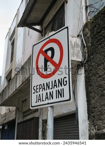 Information boards prohibit parking in marked areas