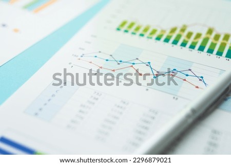 Information and data materials such as bar and pie charts used in business.
