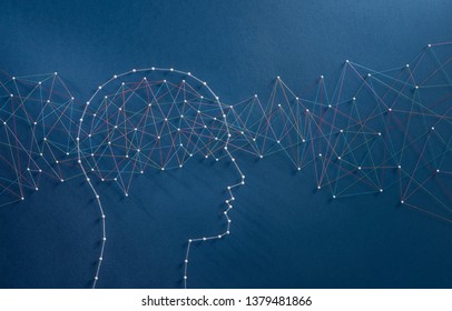 Information Flux Concept. Network Of Pins And Threads In The Shape Of A Stream Of Information Going Through A Brain Symbolising The Hyper Connected Mind Of The Digital Era.