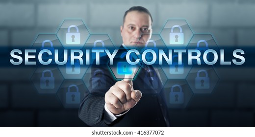 Information Manager Is Pressing SECURITY CONTROLS On An Interactive Touch Screen Interface. Business Risk Metaphor And Information Technology Concept For Protection Of Integrity Of Data.