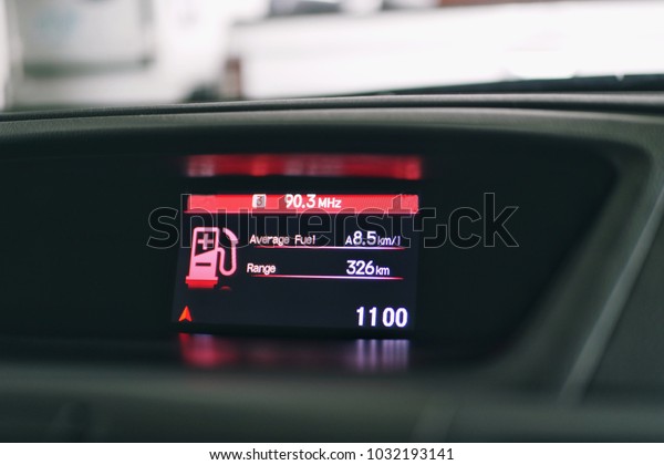 Information screen for a car\
displaying fuel monitoring, GPS, FM radio and other general\
informations. 
