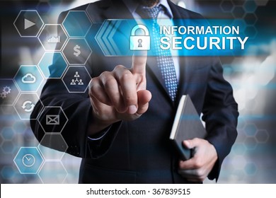 Information security concept. Businessman pointing on virtual screen with text and icons.