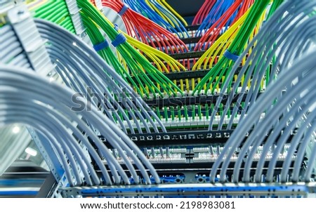 Information Technology Computer Network, colorful Telecommunication Ethernet Cables Connected to Internet Switch.