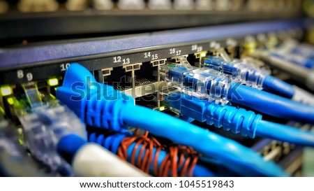 Information Technology Computer Network, Telecommunication Ethernet Cables Connected to Internet Switch In Data Center.