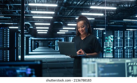 Information Technology Specialist And Data Center Administrator Working On Personal Computer, Monitoring Web Services, Cloud Computing, Analytics Facility, Performing Maintenance And Cyber Security