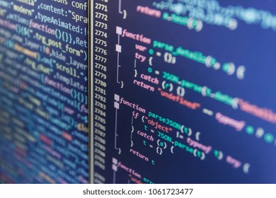 Information technology website coding standards for web design Hacker breaching net security. Website codes on computer monitor. Abstract screen of software. JavaScript code in text editor. 