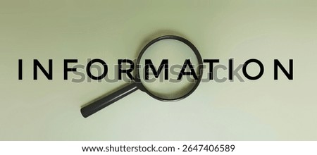 Information Text Seen Through Magnifying Glass on Green Background Representing Data Analysis, Research, Investigation, Knowledge Discovery, Business Intelligence, and Information Search Concept. 