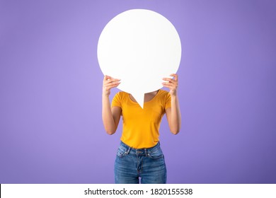 Information, Thought, Quote And Opinion Concept. Young Woman Hiding Her Face Behind Blank White Speech Bubble, Isolated On Purple Studio Background. Empty Space For Text Or Feedback On Balloon Circle