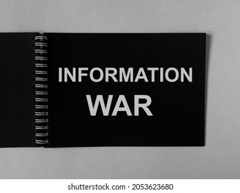 Information war, warfare word on paper. IW concept.