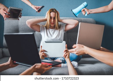 Informational digital detox. Fake news. A girl in stress and anxiety of depression closed her ears. He does not hear false information about the corona virus covid 19. - Shutterstock ID 1710722323