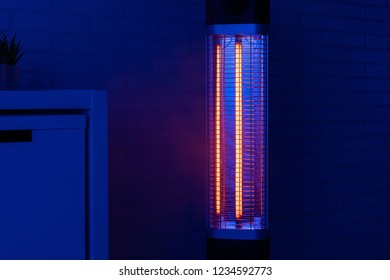 Infrared heater in the modern night room interior