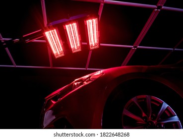 Infrared lamps for drying of car body parts after applying save gloss coating - Powered by Shutterstock