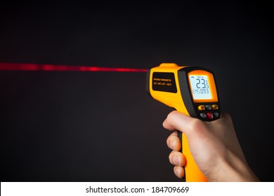 Infrared Laser Thermometer In Hand