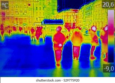 Infrared Thermal image people walking the city streets