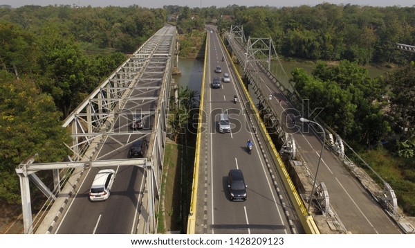 infrastructure fly over the country road, underpass\
and high way from aerial\
view