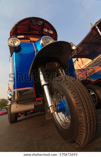Infront of Thai Style Three Wheel Taxi \