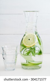 Infused Water With Cucumber, Lemons And Mint In A Pitcher