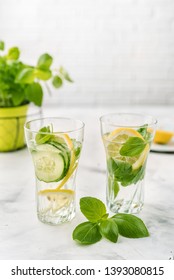 Infused Water With Lemon, Cucmber And Basil On White