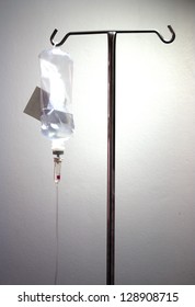 Infusion Bottle With IV Solution On White Background