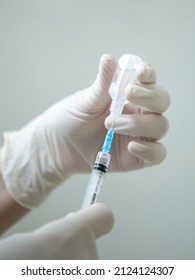 Infusion Syringe In The Hands Of A Nurse. Selective Focus