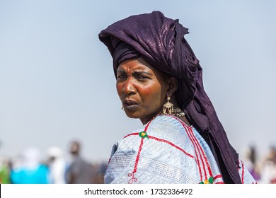 Ingall, Niger - September 2013: Tuareg Nomad Woman In Traditional Turban Sahara Desert