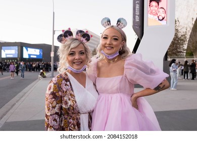 Inglewood, Los Angeles, California, USA - November 28, 2021:  BTS fans, aka "ARMY", wait for the Permission to Dance concert showing off a fashion inspired "Map of the Soul" album outfit.  