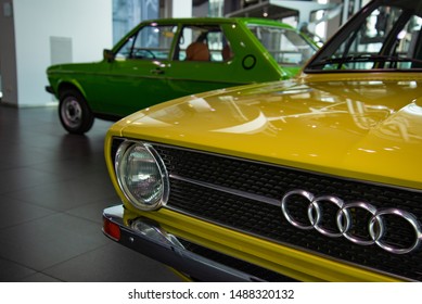 Ingolstadt, Germany - April 9, 2019: Audi 80 B1 first generation front wheel drive classic German 'Car of the 1973 year' with legendary EA827 engine in the AUDI museum mobile. Green Audi 50 background
