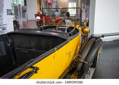 Ingolstadt, Germany - April 9, 2019: Audi 14/35 PS TYP C 'ALPENSIEGER' 1919 Open Touring Body (Phaeton) With Carbide-bulb Lighting System. Third Audi Model Type C Of 1911. Audi Museum Mobile.