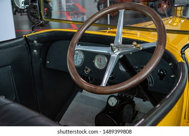 Ingolstadt, Germany - April 9, 2019: Audi 14/35 PS TYP C 'ALPENSIEGER' 1919 Open Touring Body (Phaeton) With Carbide-bulb Lighting System. Third Audi Model Type C Of 1911. Steering Wheel.