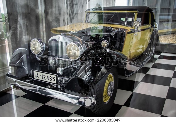 Ingolstadt, Germany - July 5 2022: Historic\
collection of Audi racing cars and brands like horch, dkw, auto\
union, nsu. Exhibition of vintage roadster, motorcycle, silver\
arrow and a8, tt, r8\
models