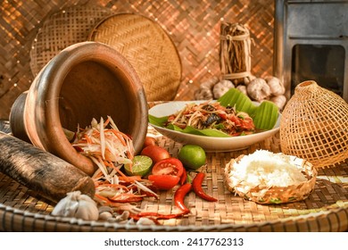 Ingredient for cooking papaya salad,Sticky rice, papaya salad, Som Tam , som tum, thai food, isan food,Thai isan kitchen , som tum lao, morning light, thai kitchen background - Powered by Shutterstock