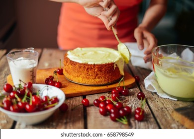Ingredients for baking cake stuffed with fresh cherry pie. Female preparing cherry pie. Rustic dark style. See series recipe step on step. Womans hands. Recipe for homemade pie on short pastry