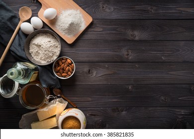 Ingredients For Baking On A Wooden Background Top View