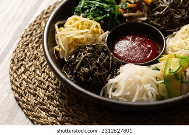 Ingredients for bibimbap, red pepper paste and various vegetables