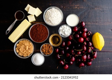 Ingredients For Bourbon Cherry Chocolate Galette: Fresh Cherries, Cocoa Powder, And Other Ingredients For Baking A Dessert