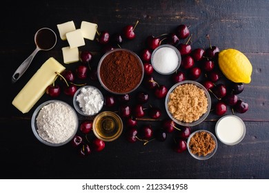 Ingredients For Bourbon Cherry Chocolate Galette: Fresh Cherries, Cocoa Powder, And Other Ingredients For Baking A Dessert