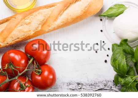 Similar – Image, Stock Photo Bruschetta with cream cheese, cherry tomatoes and basil