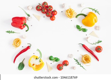 Ingredients for cooking pasta on white background. Fettuccine, fresh vegetables, cheese, mushrooms, spice. Italian food concept. Flat lay, top view, copy space - Powered by Shutterstock