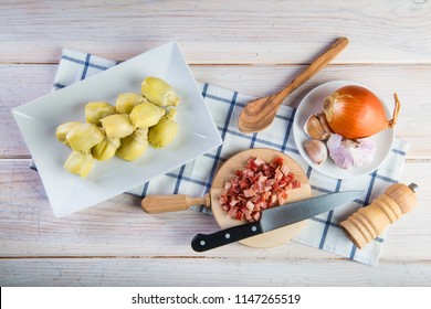 Ingredients for cooking sauteed baby artichoke hearts with ham